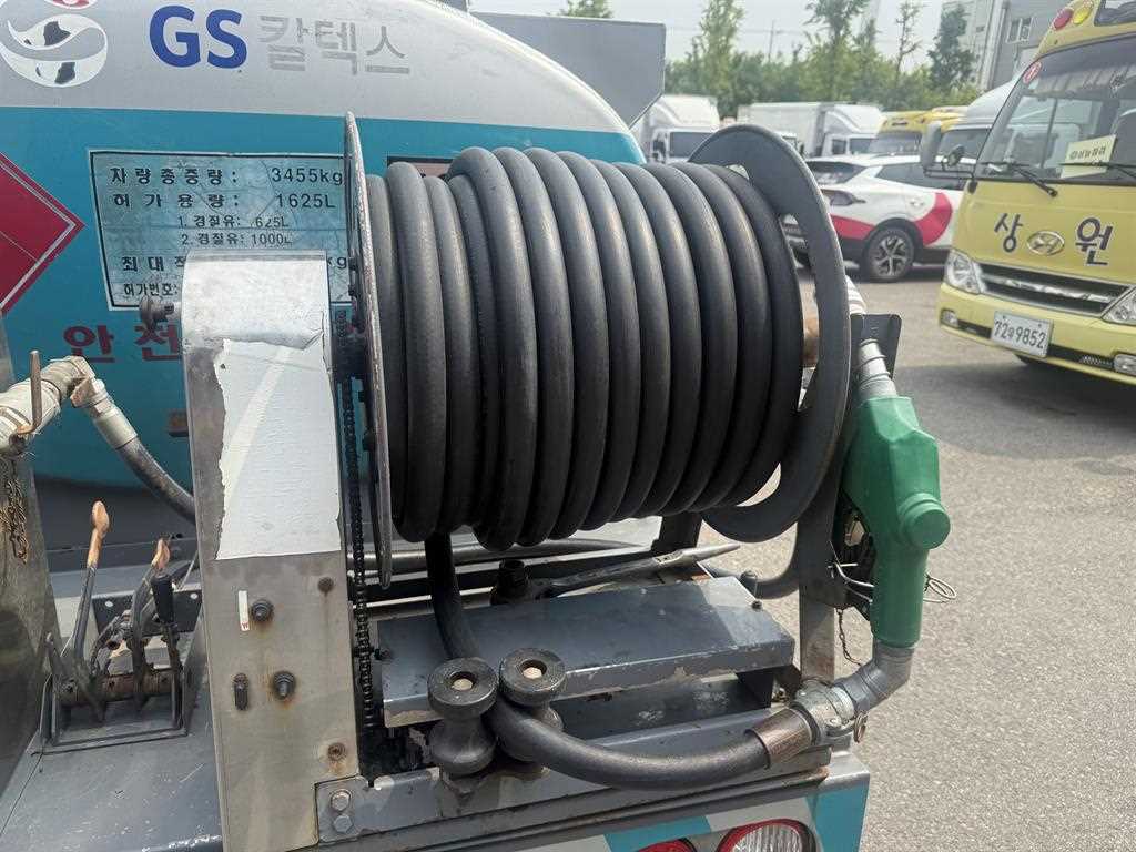 기아 봉고 1톤 탱크로리 2009년식 전동 호스 릴과 탱크 표기