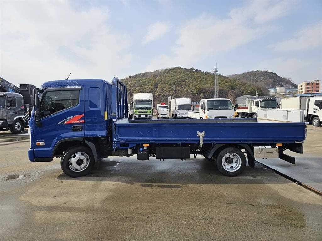 현대 마이티 2.5톤 카고 2024년식 저상 카고 운전석 쪽 측면